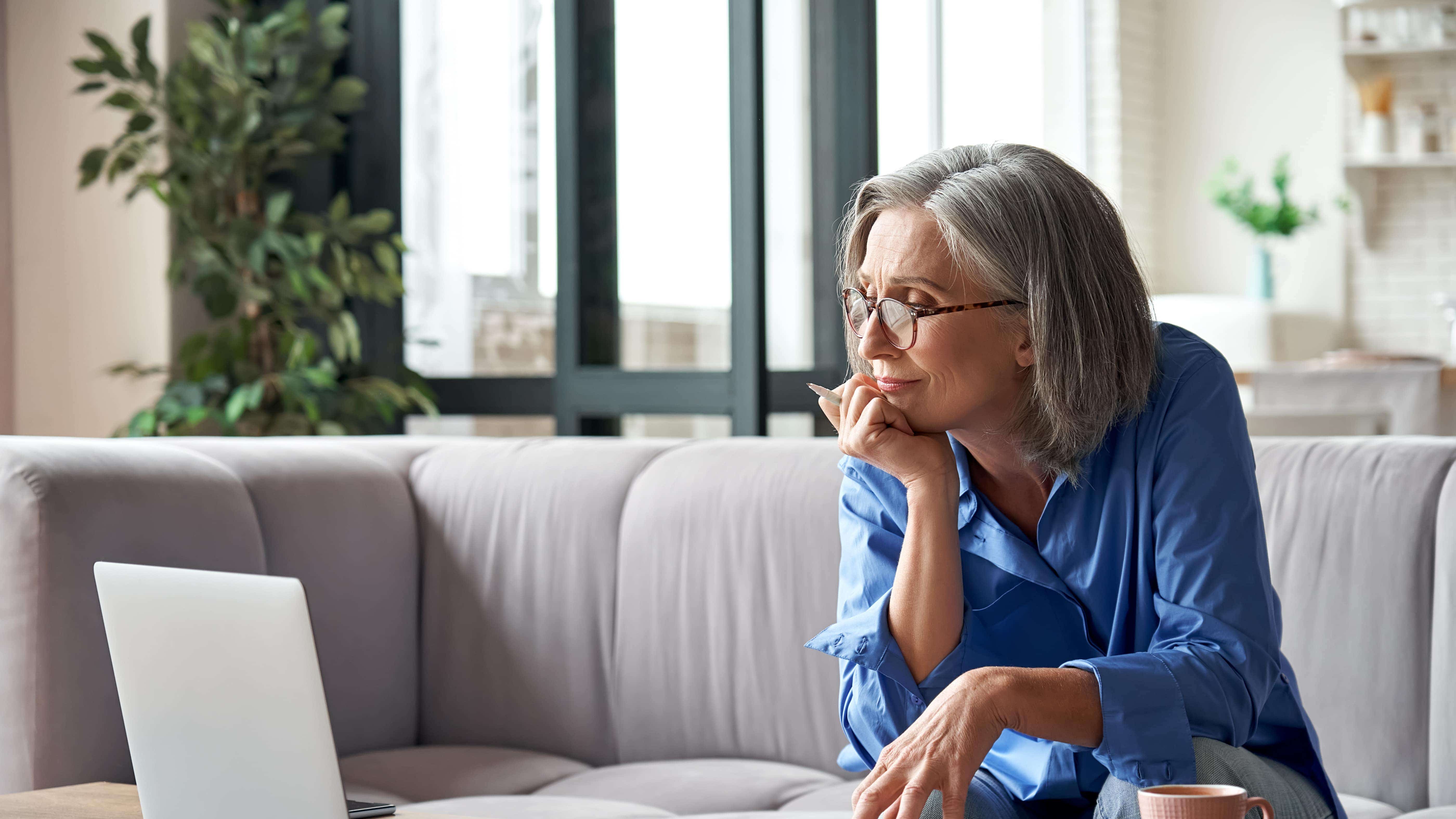 A woman looking through her paperwork.