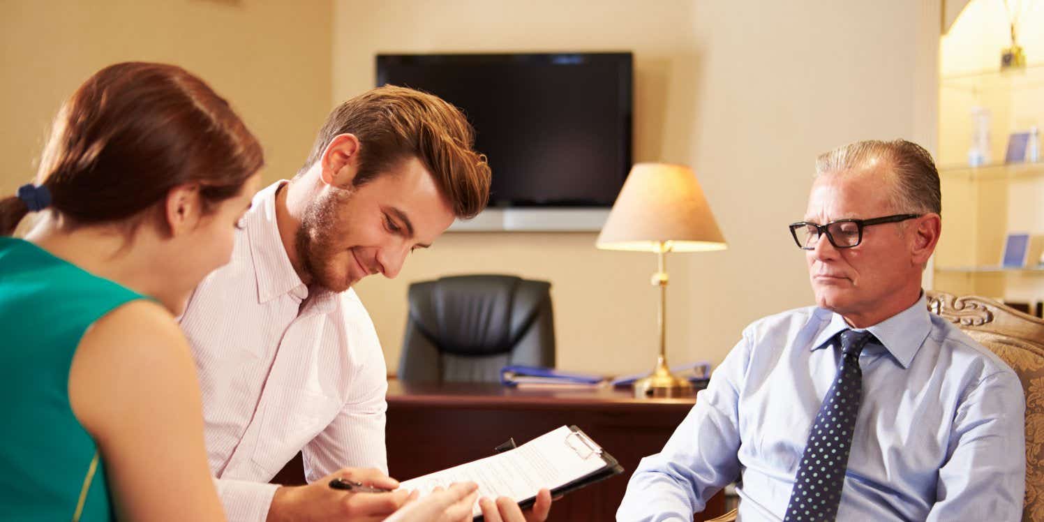 Financial adviser with young couple