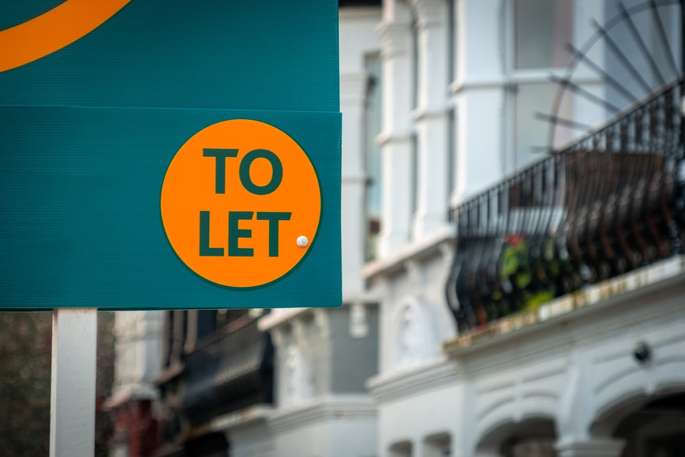 An image of a 'To Let' board installed outside a property.