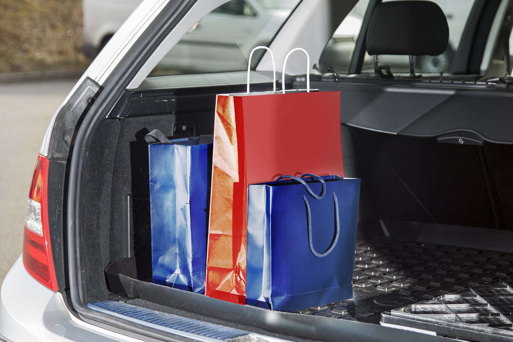 Shopping bags in a car boot