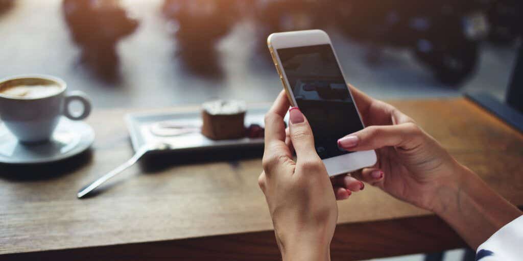 Woman holding mobile phone