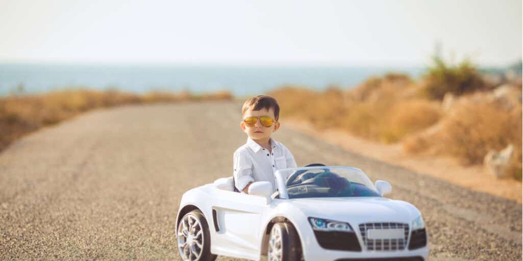 Boy in toy car