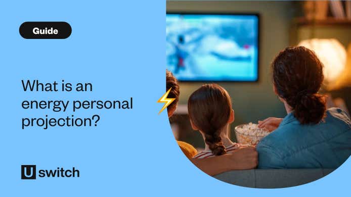 Family watching TV at home with lamp on