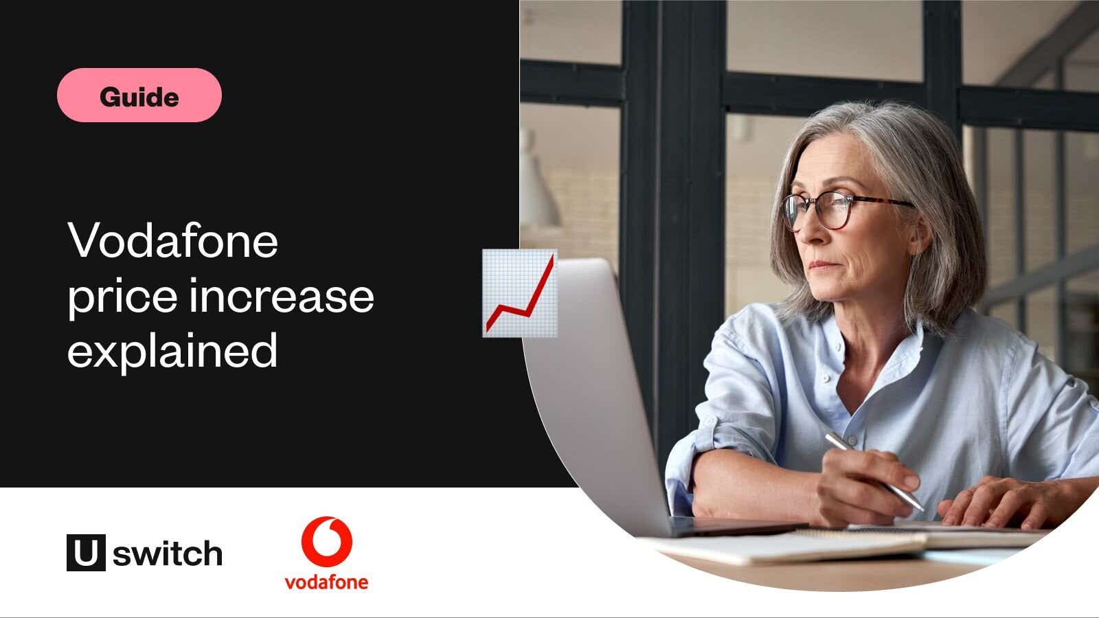 woman sat at her kitchen table looking at her bills