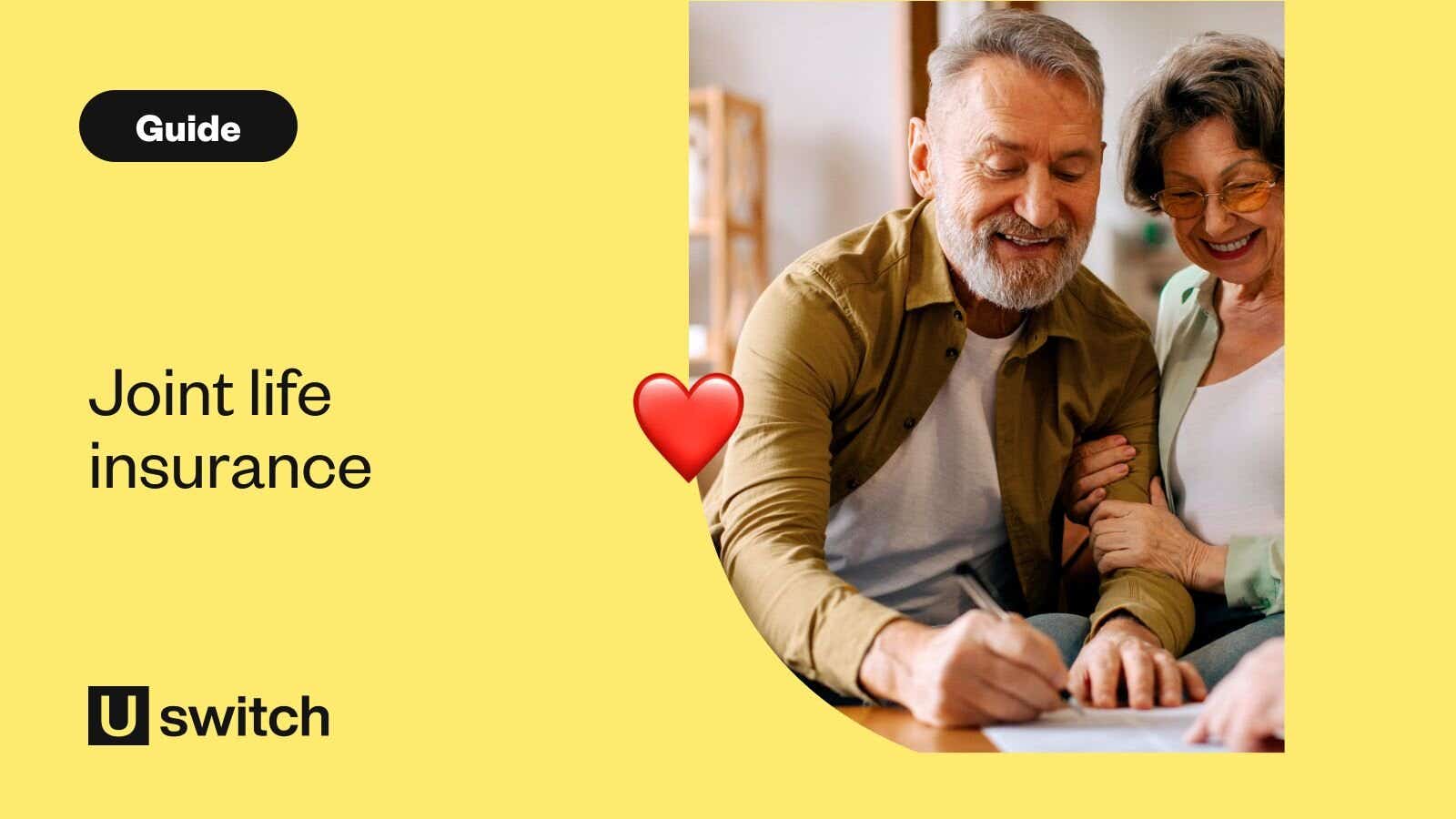 A smiling older couple signing documents together