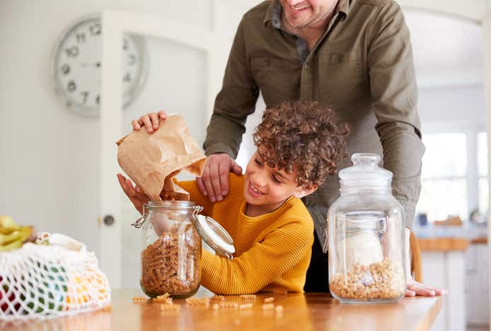 Parent and child reducing their food waste