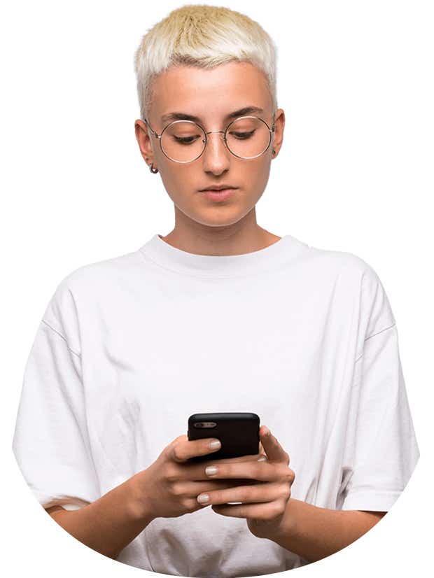 A woman holding a phone focusing 