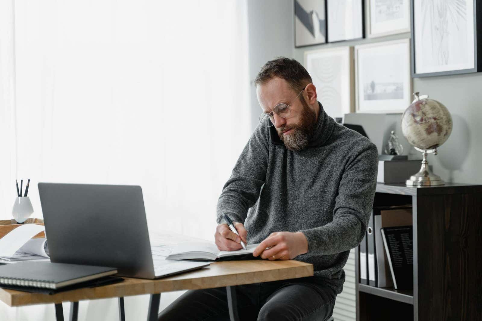 Man paying his energy bill at home