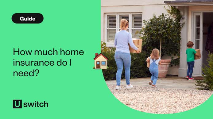 Family carrying boxes into home
