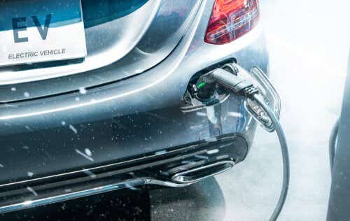 Electric car charging in rain