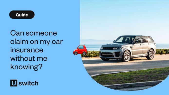 A grey car driving along a coastal road