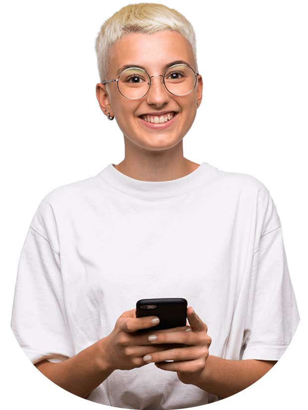 Young woman smiling holding her phone