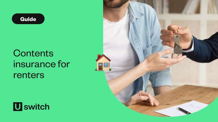Man handing over house keys to couple