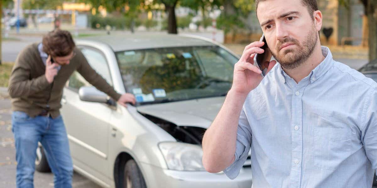 Car accident two men on their phones