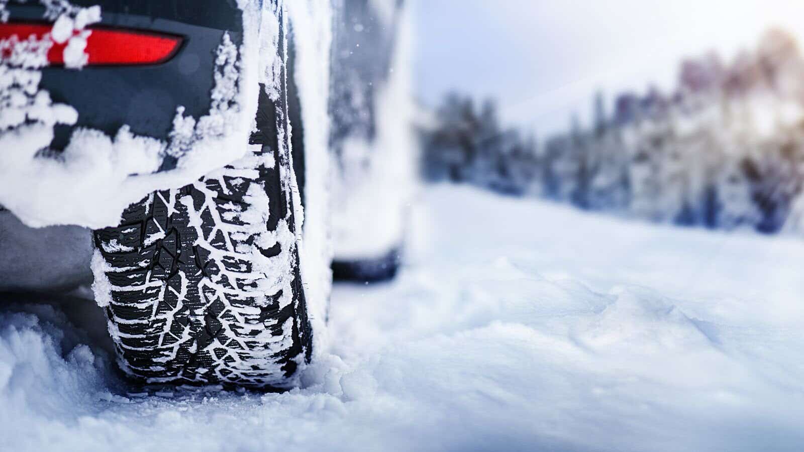 Car tyres covered in snow