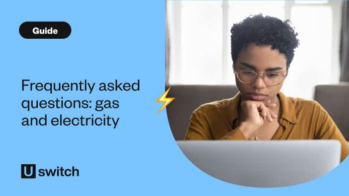 Woman pondering energy questions in front of laptop
