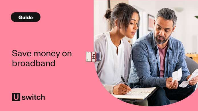 two people at home sorting out their bills