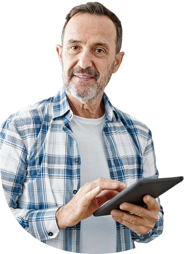 Man on a tablet smiling