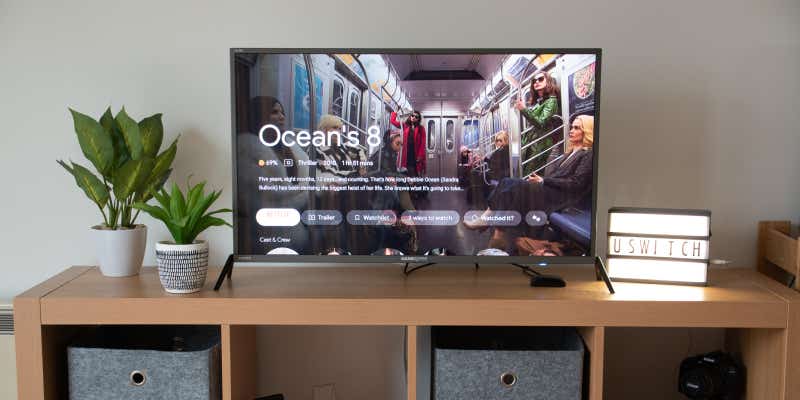 google chromecast on tv with Ocean's 8 displayed on screen