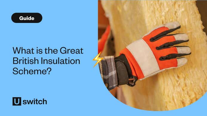 Worker installing wall insulation