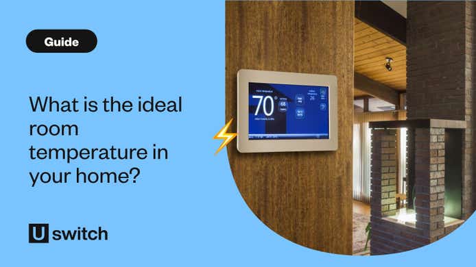 Smart thermostat on wall of living room with chairs