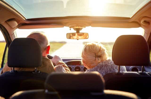 Elderly couple driving