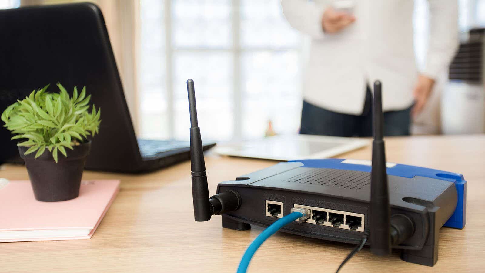 man connecting to a wireless router on his phone