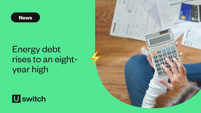 Person in energy debt working out finances