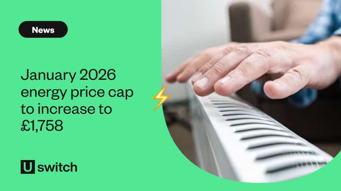 Person warming hands over electric radiator