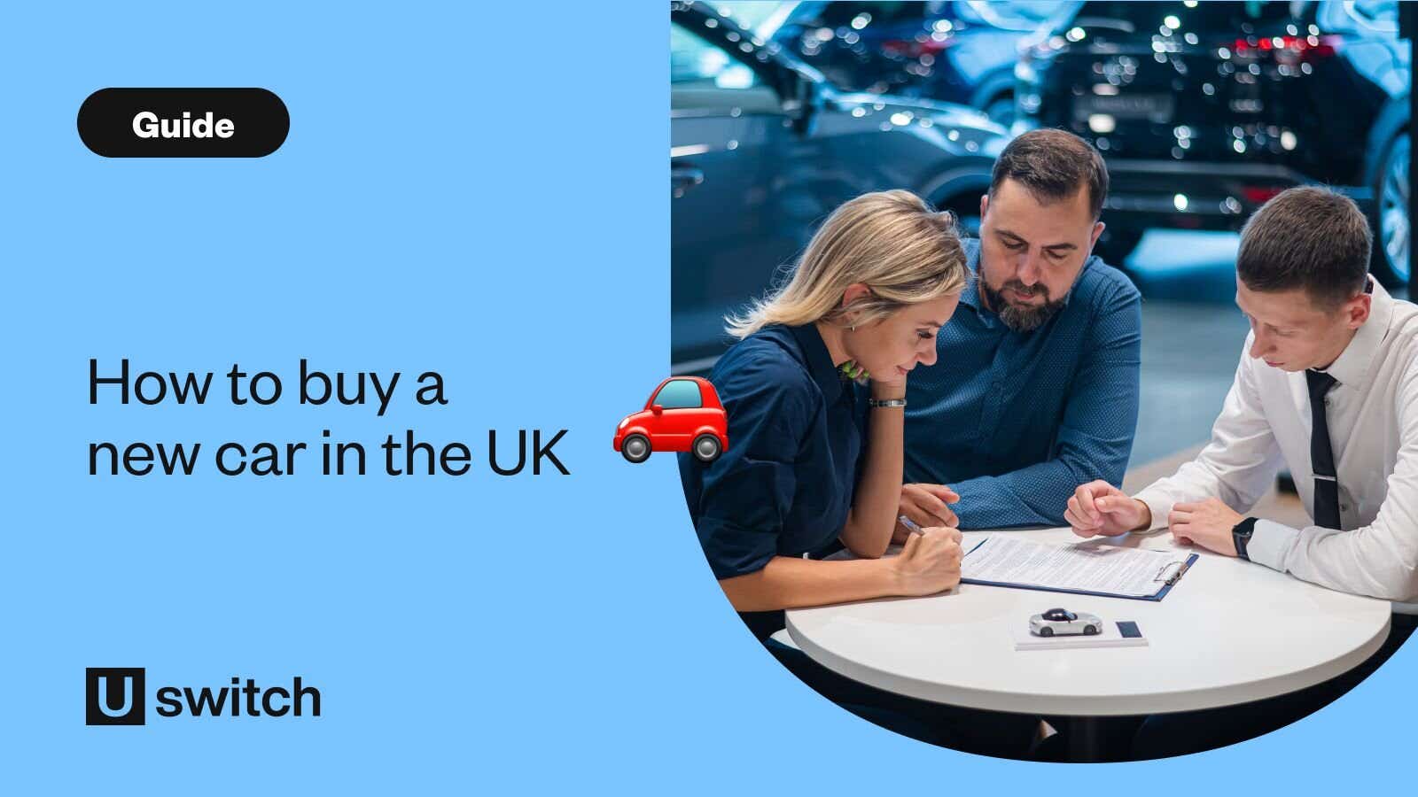 couple sitting down at a table looking at a white document with an advisor sat next to them