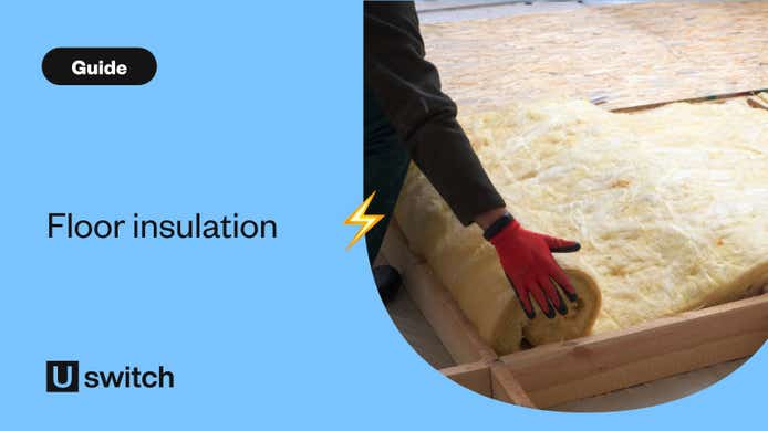 Worker installing floor insulation