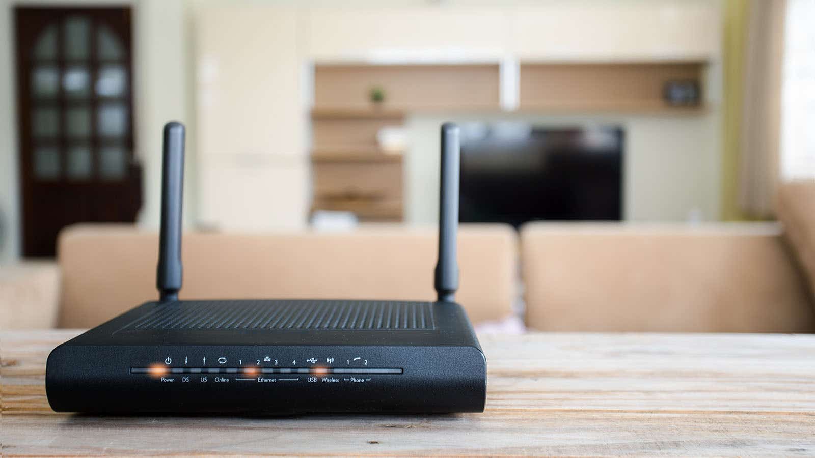 a wireless router sat on a table in a living room