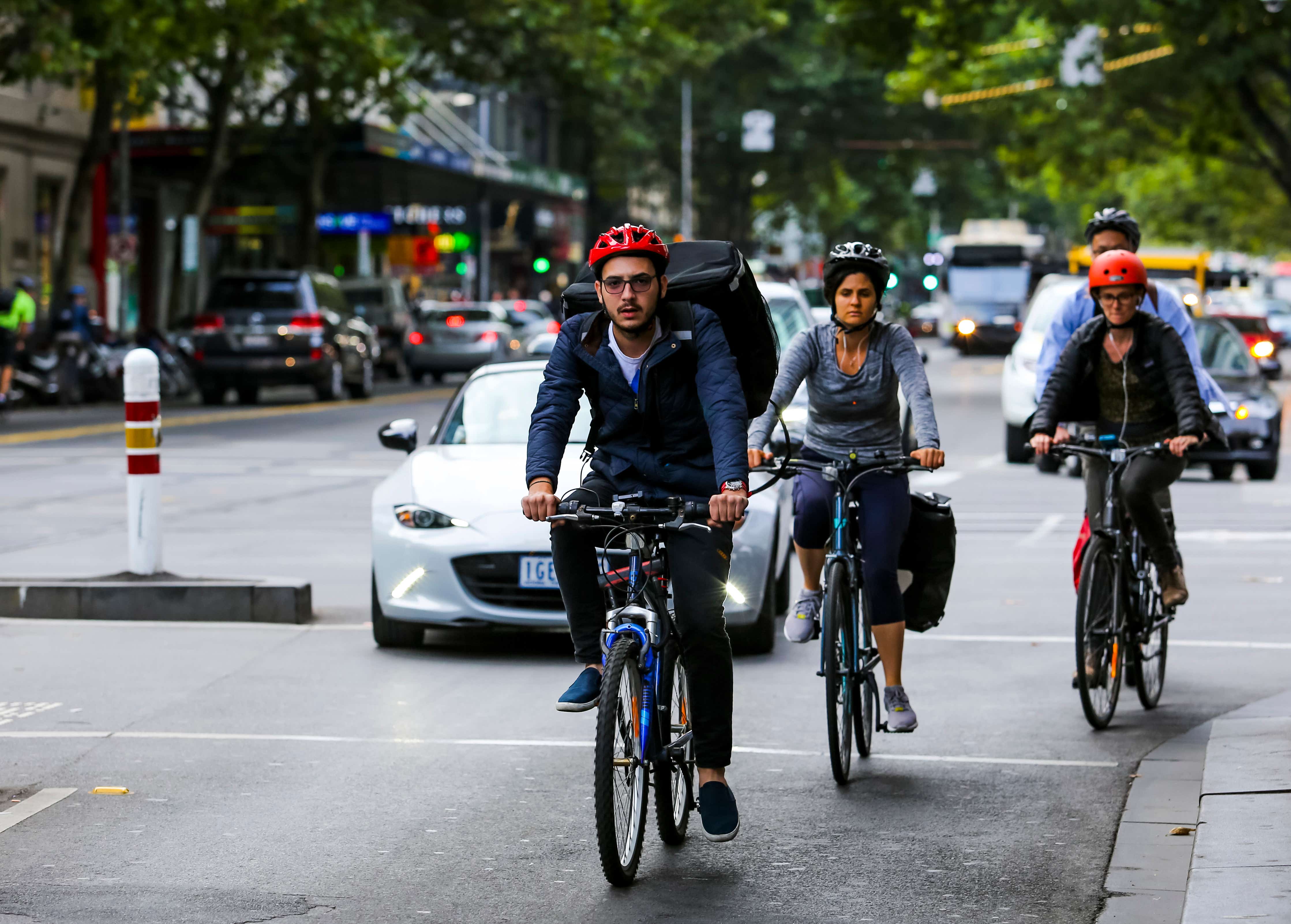 Cyclists in a group, blocking cars
