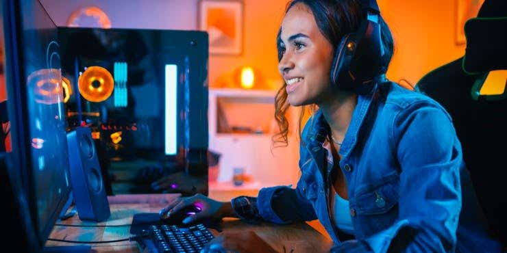 woman enjoying gaming online at home