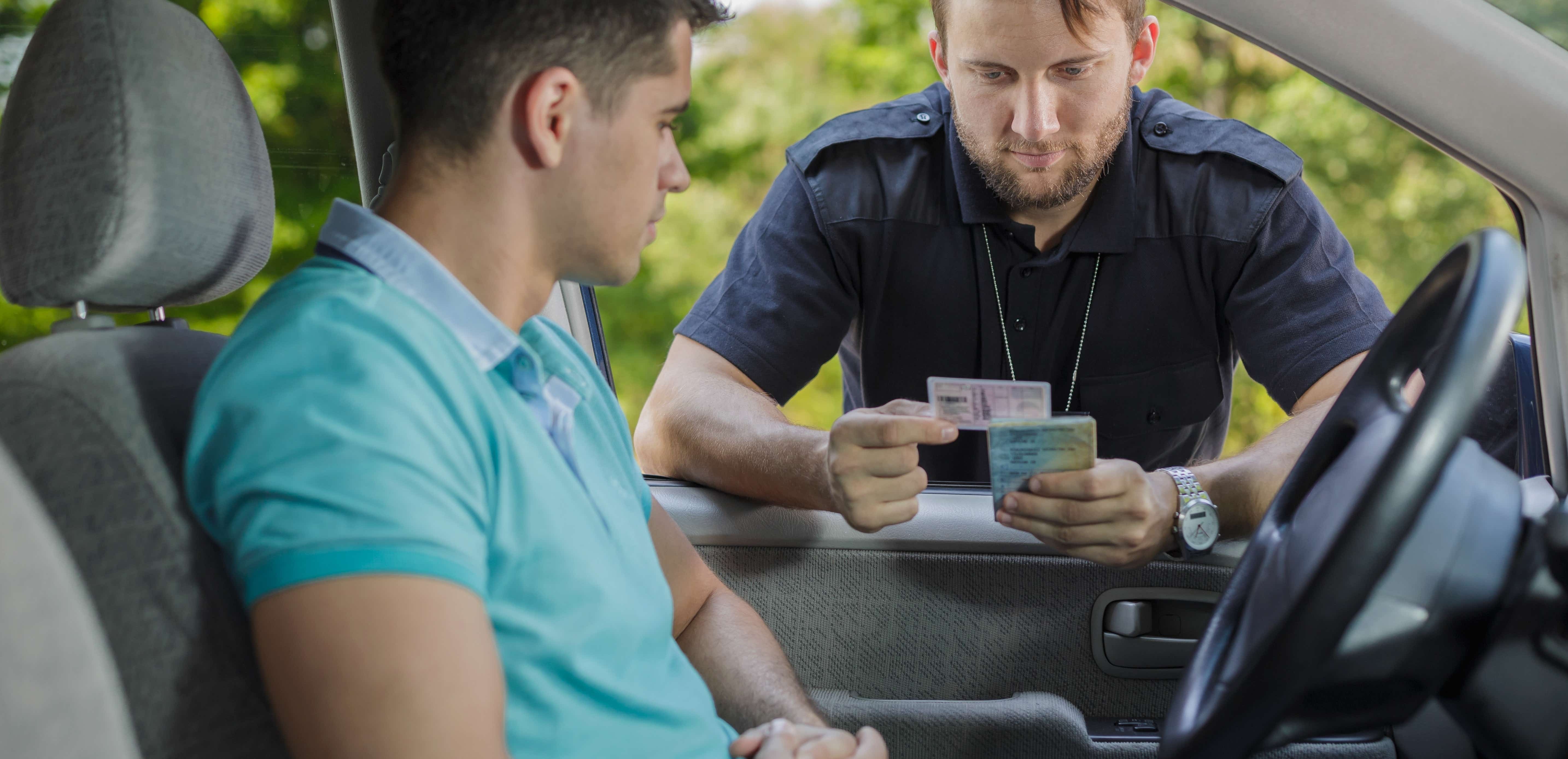 Policeman checking Drivers' ID