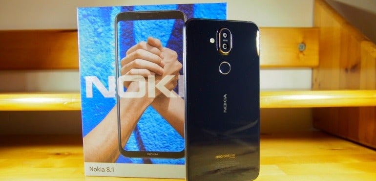 Nokia 8.1 next to box hero size