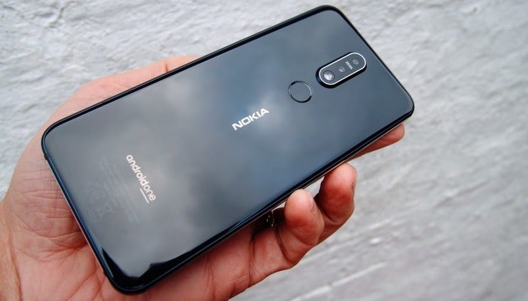 Nokia 7.1 black back in hand