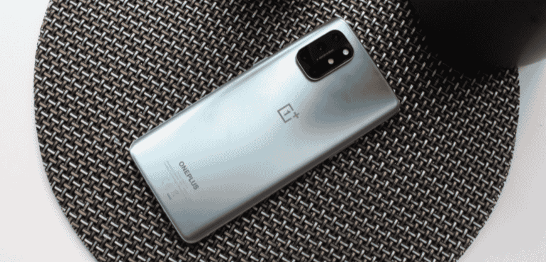 OnePlus 8T silver back on table hero