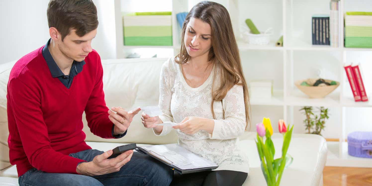 couple with calculator