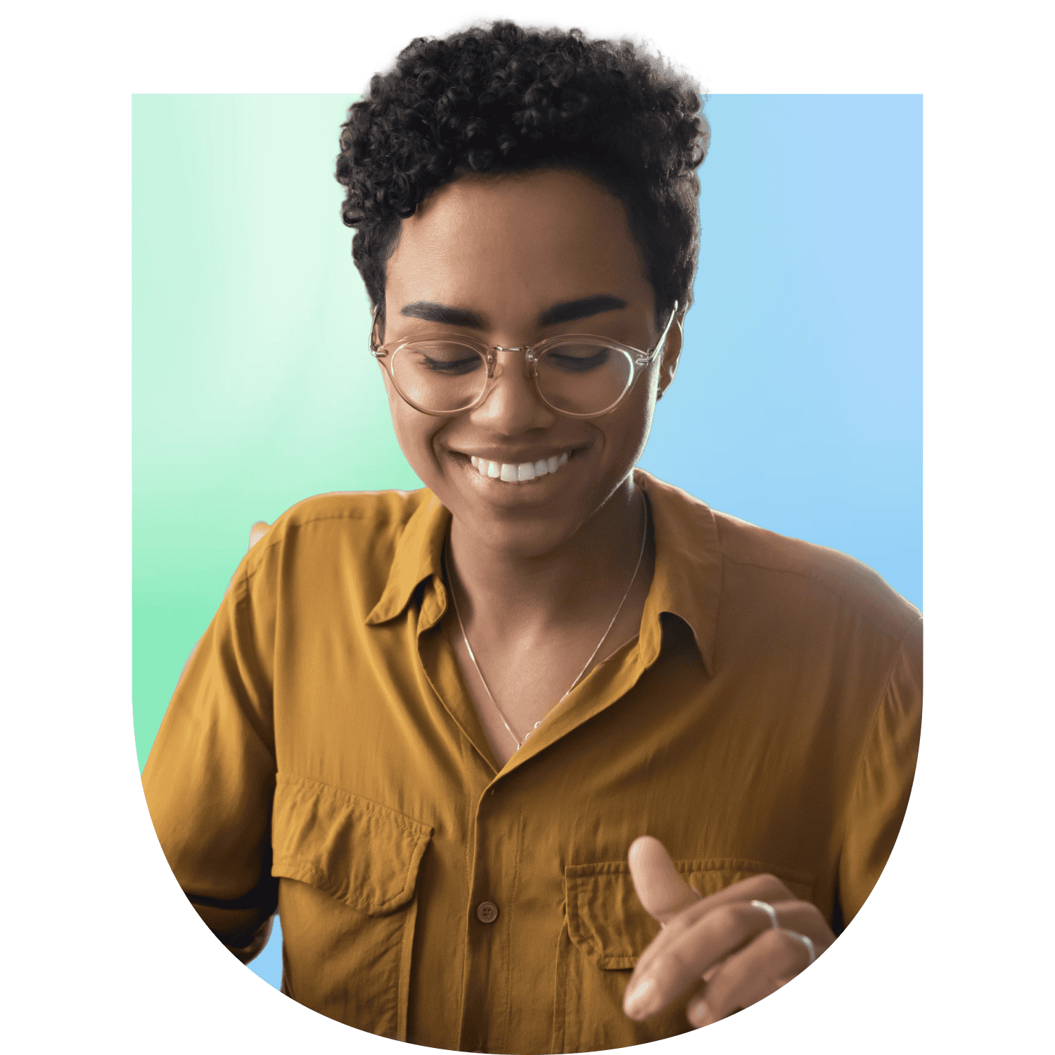 Woman smiling looking down at something