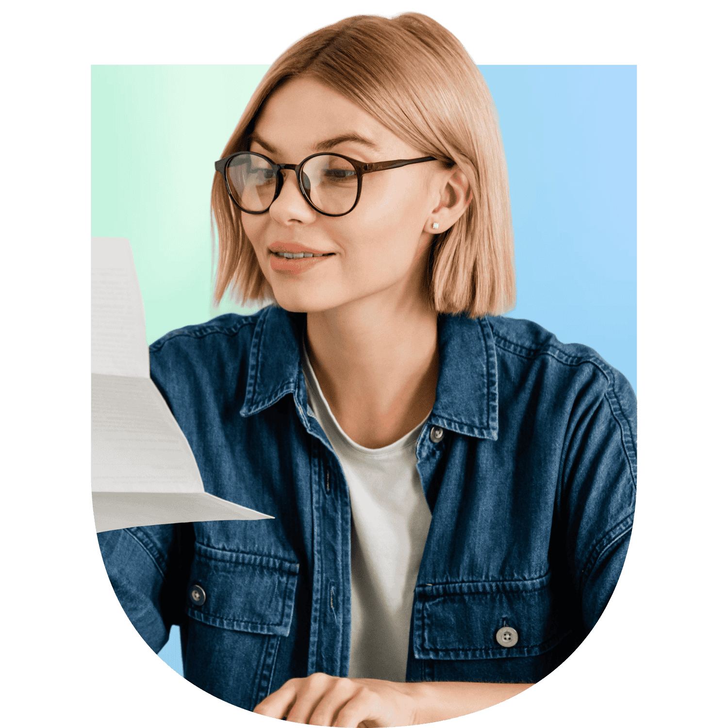 Woman wearing glasses looking at a piece of paper