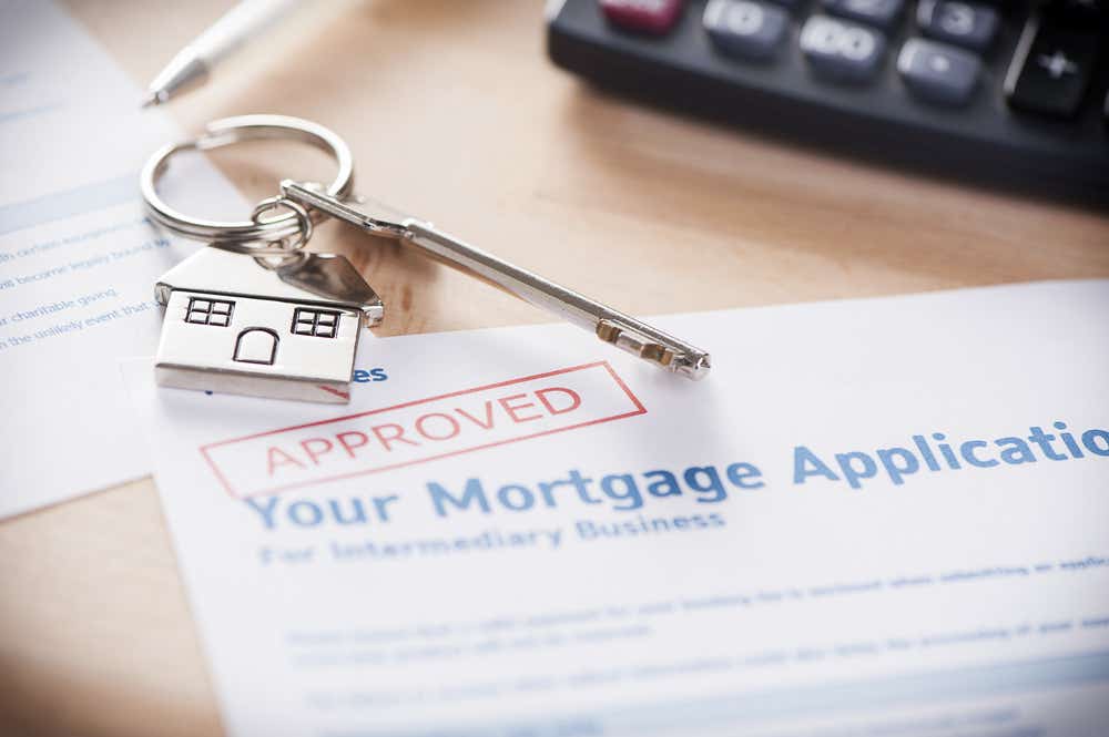 The 95% LTV mortgage guarantee scheme - mortgage application with 'approved' stamp