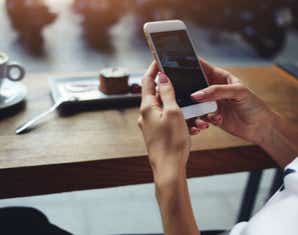 Hand holding mobile phone