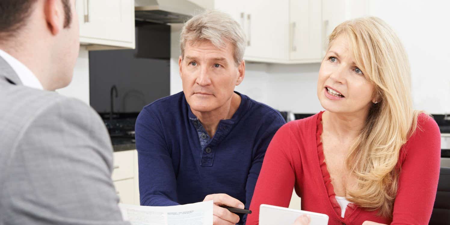 Concerned couple with advisor