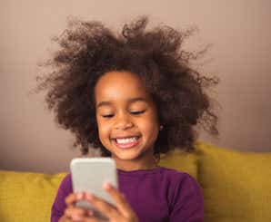 Young girl taking selfie