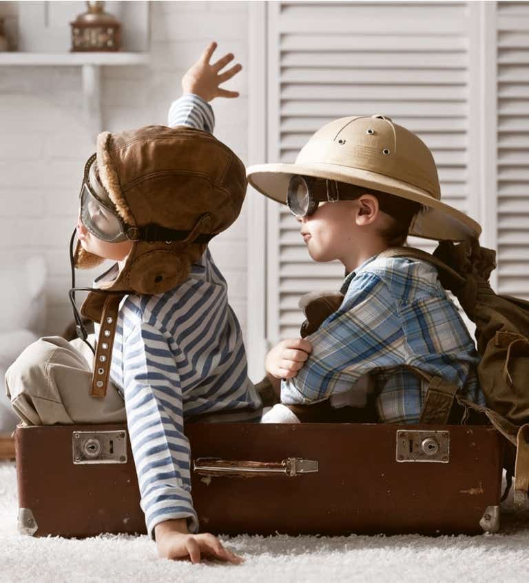 Young kids in travel costumes 
