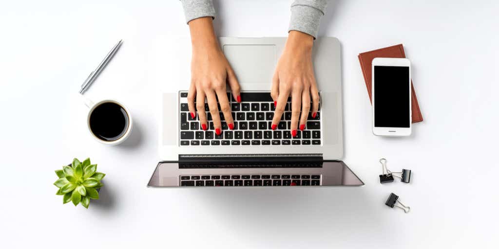 Laptop on white table