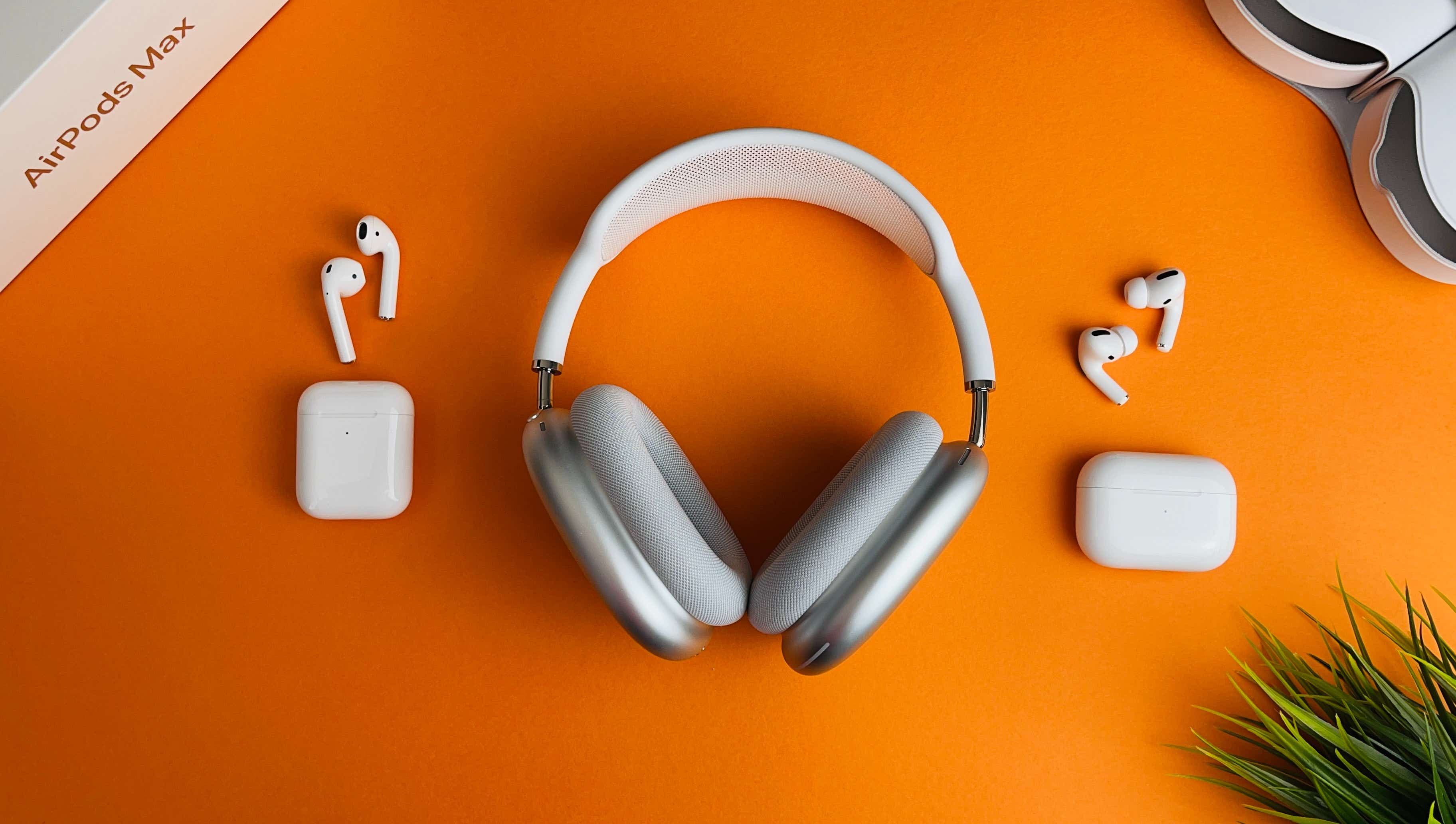 Airpod max and airpods against an orange background