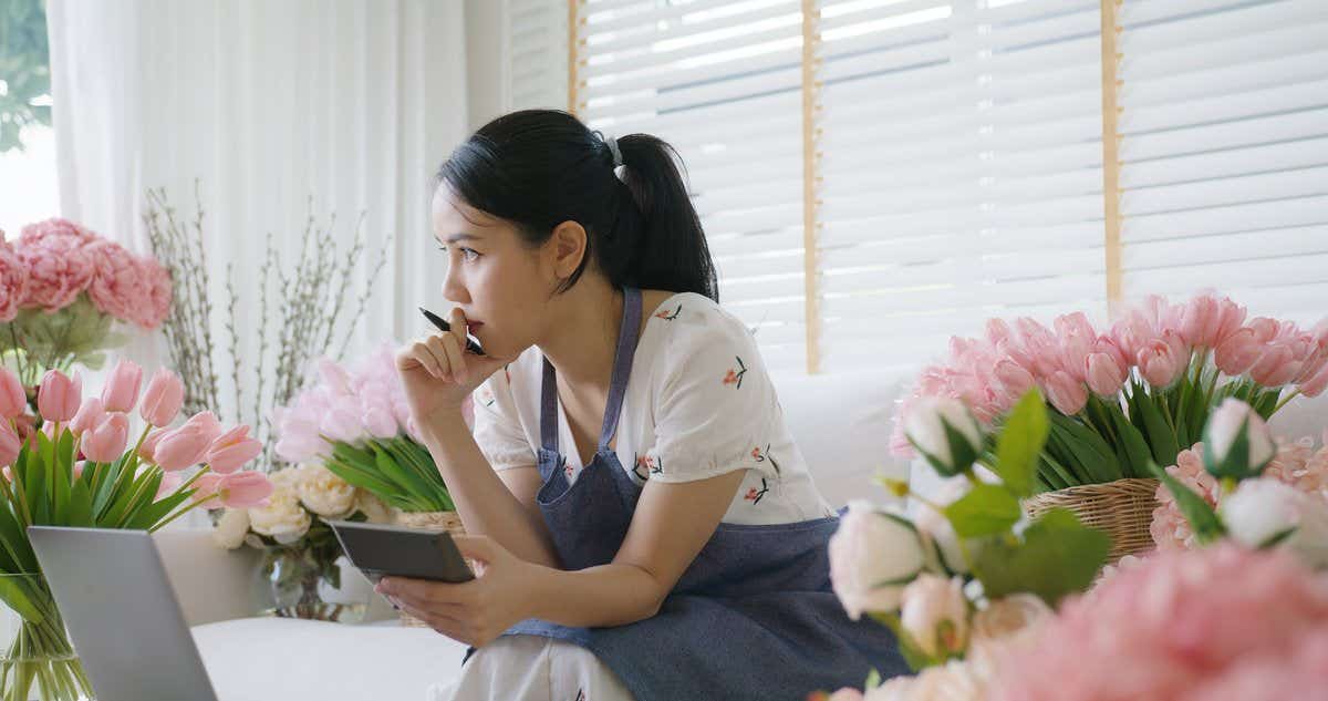 woman thinking about flower business
