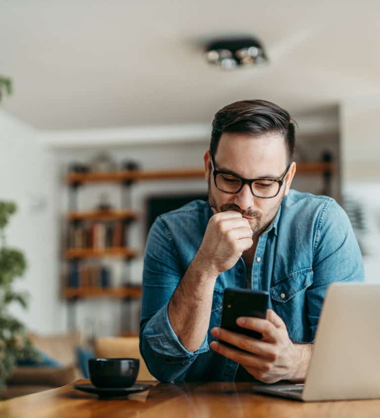 Man using mobile phone 768 x 845